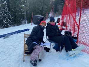 Parent volunteers recording times on the race course